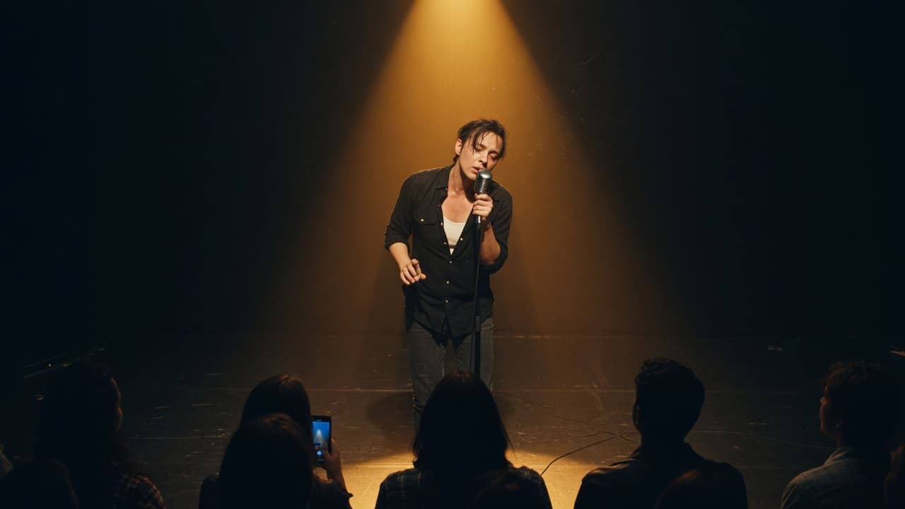 Solo artist under dramatic amber spotlight, microphone in hand